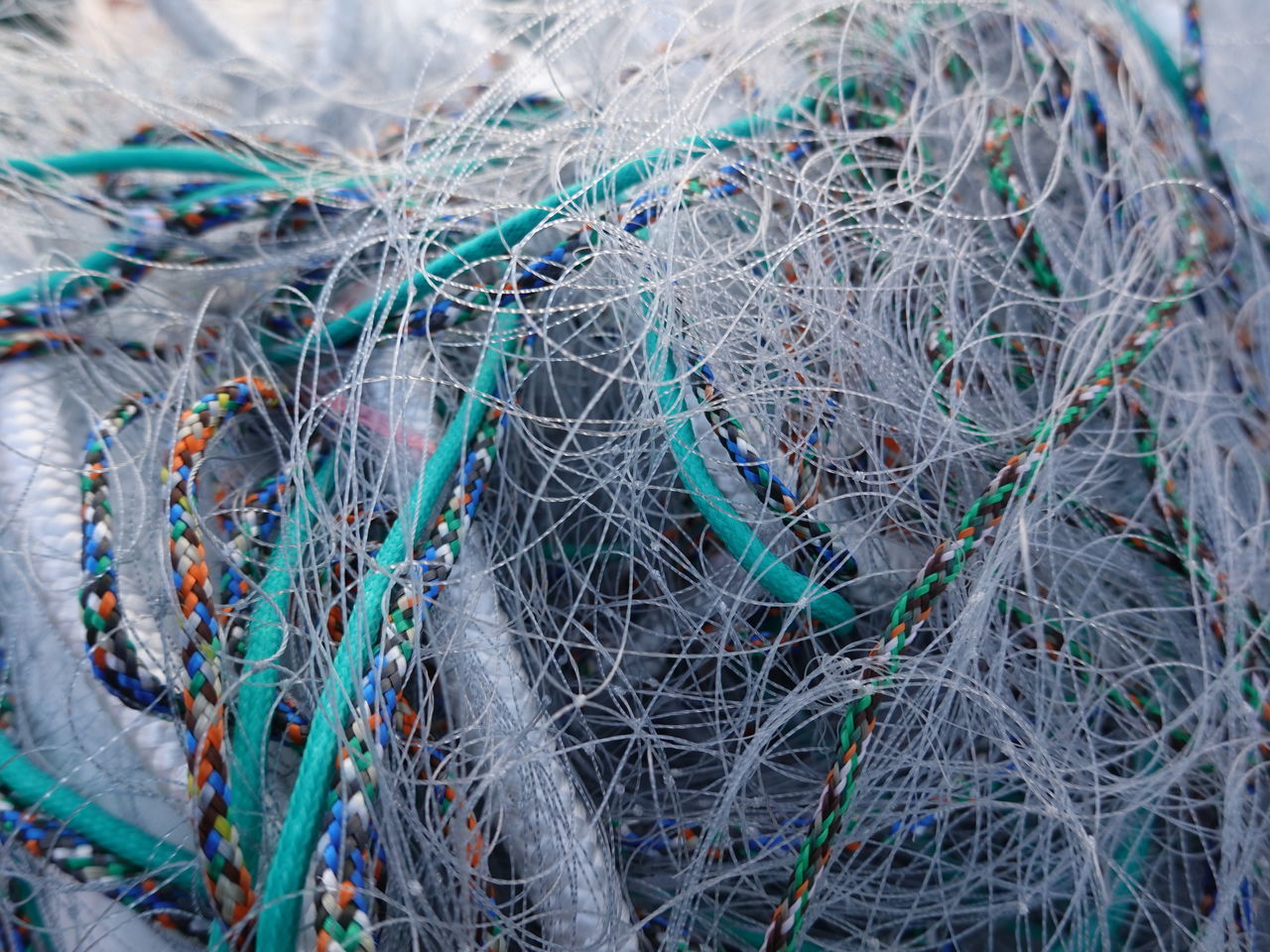 HIGH ANGLE VIEW OF FISHING NET