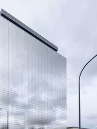 Low angle view of modern building against sky