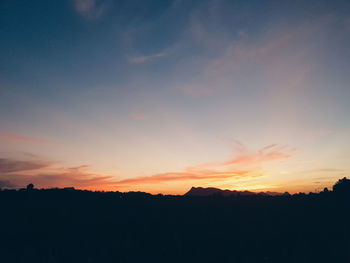 Scenic view of dramatic sky during sunset