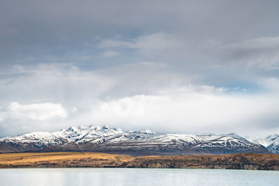 Scenic view of lake tekapo east bank. beautiful view driving along the lilybank road in lake tekapo.