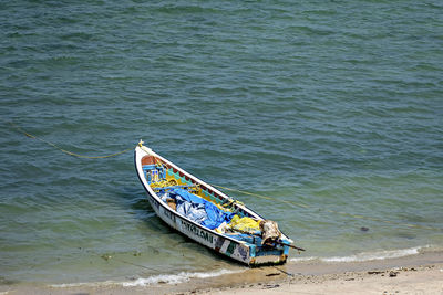 Small fishing boat with equipment parked at sea shore at rameswaram , india.