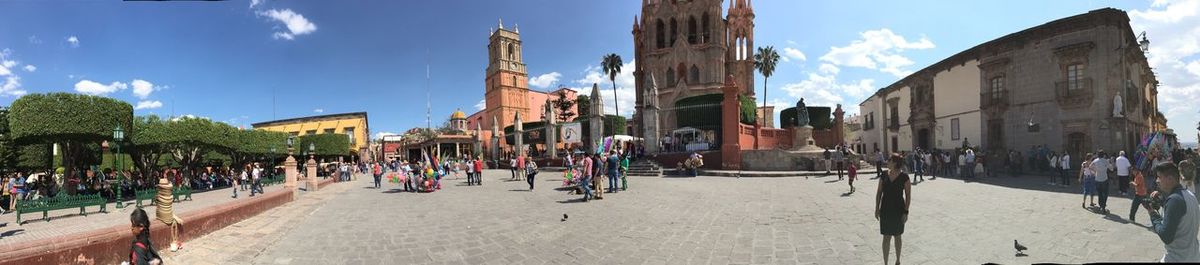 Panoramic shot of cityscape against sky