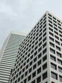 Low angle view of modern building against sky