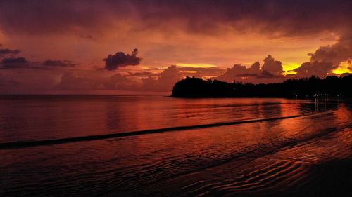 Scenic view of sea against sky at sunset