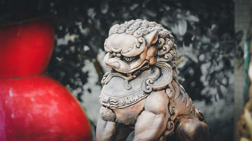 Close-up of statue against blurred background