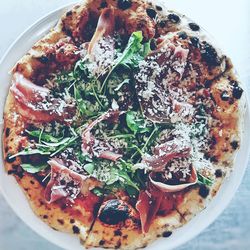 High angle view of pizza served in plate