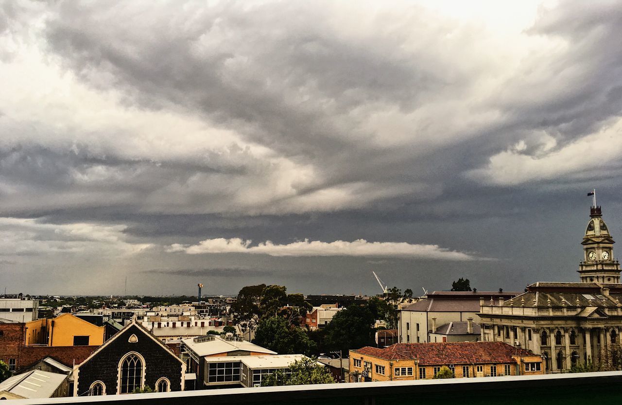 VIEW OF BUILDINGS IN CITY AGAINST SKY