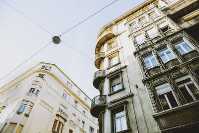 Low angle view of buildings against clear sky