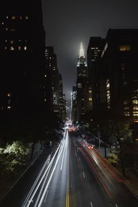 Light trails on city street at night