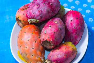 High angle view of fruits in plate on table