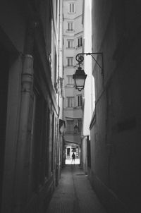 Alley amidst buildings in city