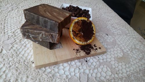 High angle view of chocolate cake on cutting board