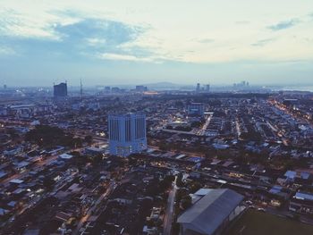 High angle shot of cityscape against the sky