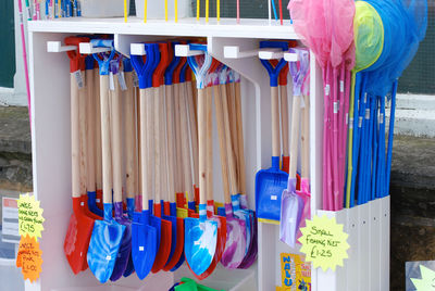 Colorful gardening equipment with fishing nets for sale at market