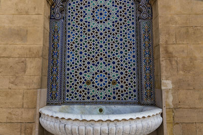 View of ornate window on wall of building