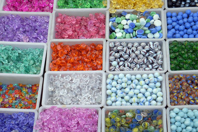 Multi colored beads and tools for making jewelry and crafts