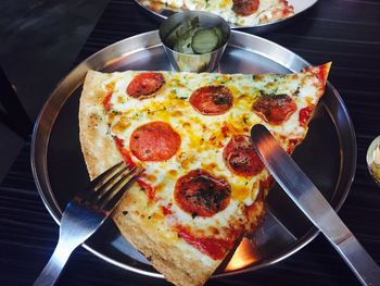 High angle view of pizza on table