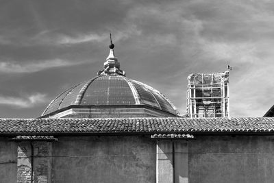 View of building against cloudy sky