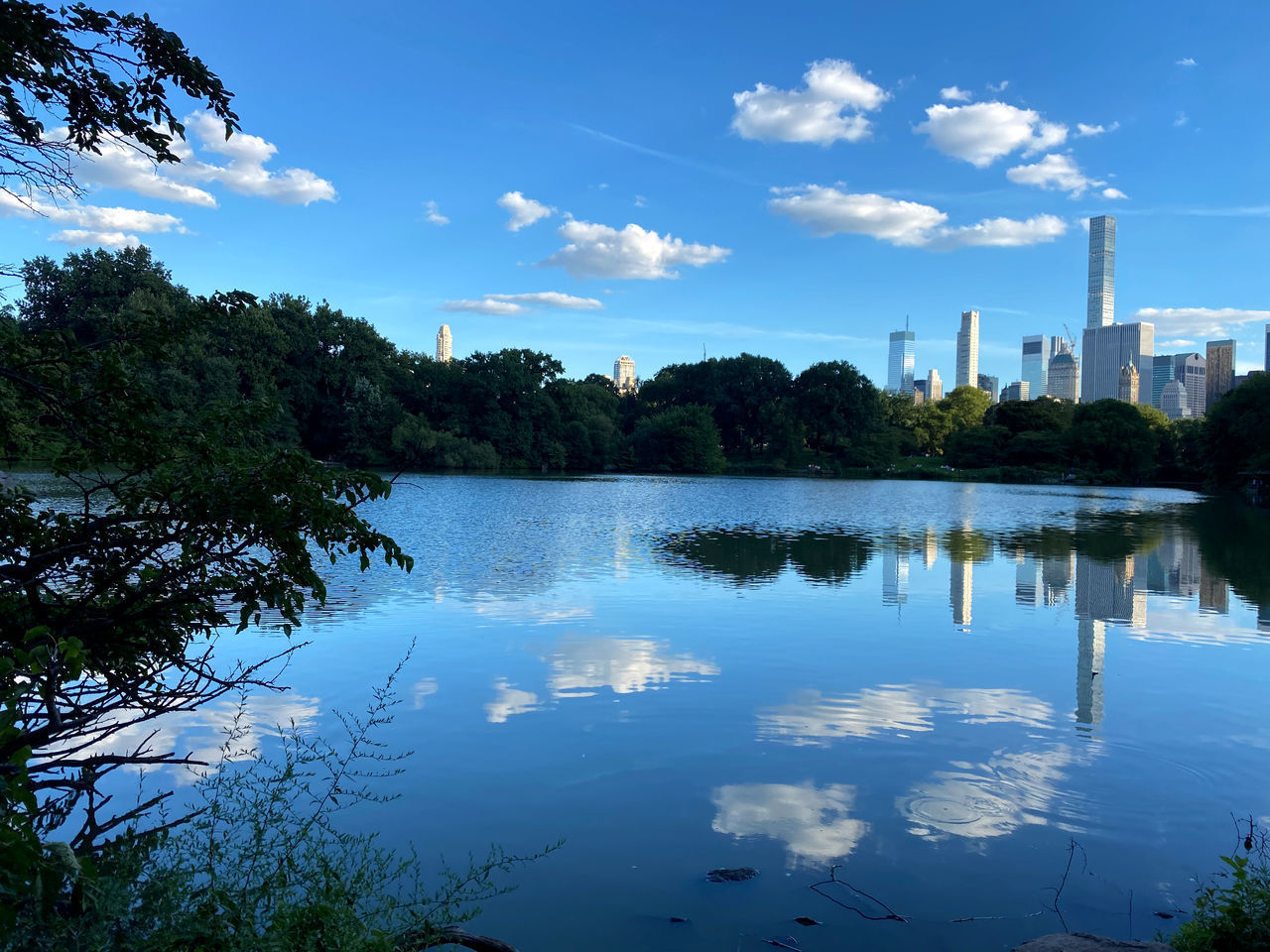 SCENIC VIEW OF LAKE AGAINST BLUE SKY