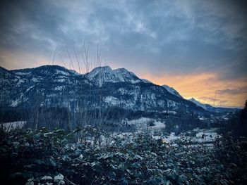 Scenic view of mountains against sky during sunset