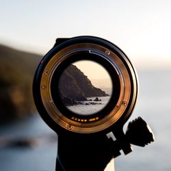 Close-up of sea seen through lens