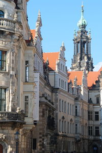 Buildings against blue sky