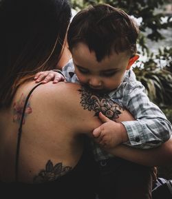 Rear view of cute boy