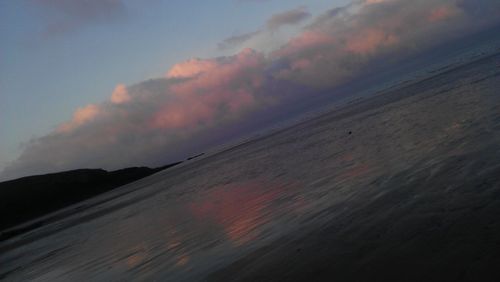 Scenic view of landscape against sky during sunset