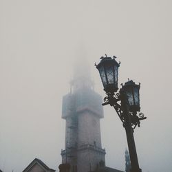 Low angle view of street light against sky