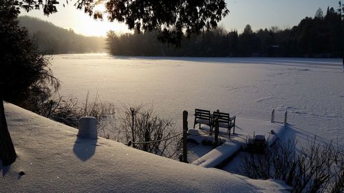 Scenic view of frozen lake against sky