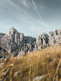 Scenic view of rocky mountains against sky