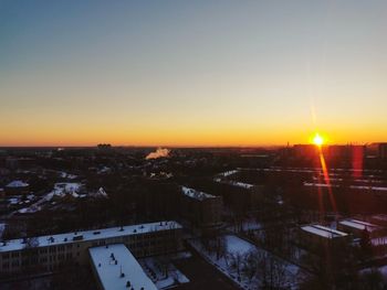 High angle view of townscape against sky during sunset