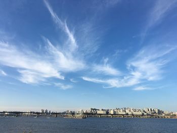 Scenic view of sea against blue sky