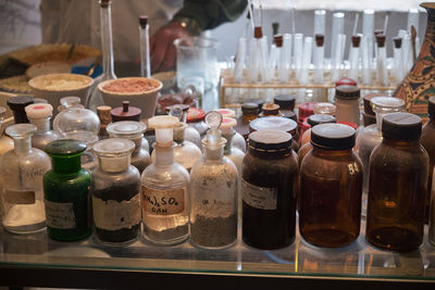 Close-up of glass bottles on table