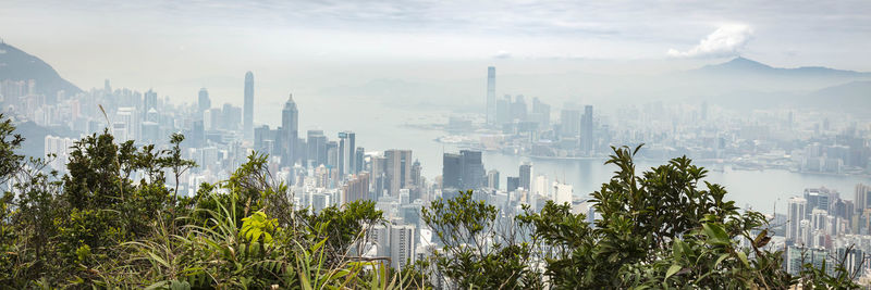 Modern buildings in city against sky