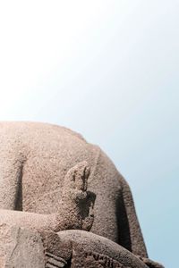 Low angle view of sculpture against clear sky
