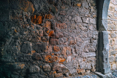 Low angle view of stone wall