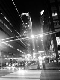 Traffic on city street at night