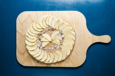 High angle view of ice cream on cutting board