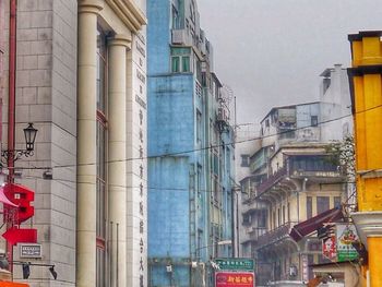 Low angle view of buildings against sky