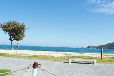 Scenic view of sea against clear blue sky