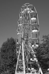 Low angle view of ferris wheel against sky