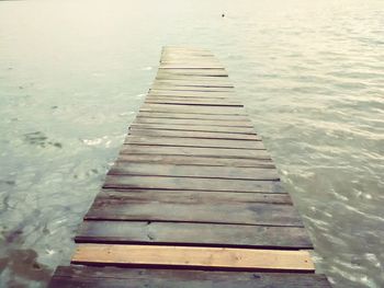 High angle view of wooden pier over lake