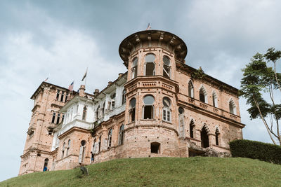 Low angle view of historical building against sky