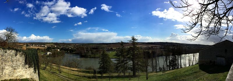 Scenic view of landscape against cloudy sky