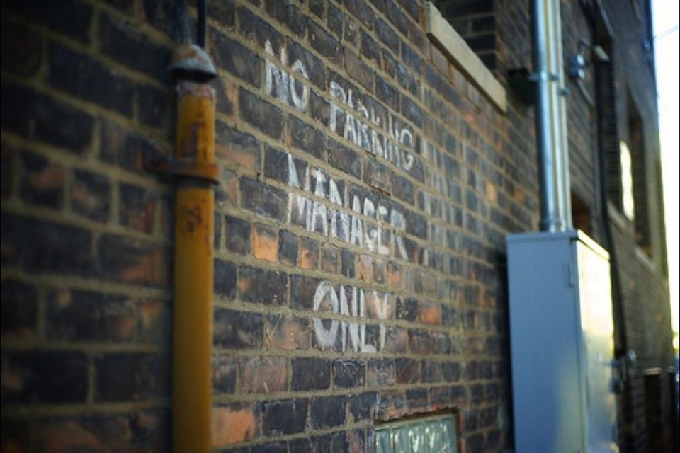 architecture, building exterior, built structure, low angle view, window, close-up, building, metal, focus on foreground, old, wall - building feature, no people, outdoors, safety, brick wall, lighting equipment, day, protection, house, reflection