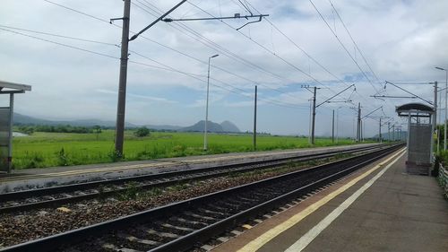 Railroad tracks against sky