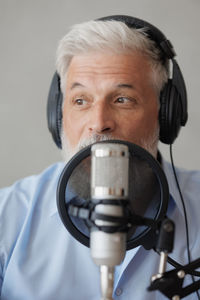 Close-up portrait of young man with headphones