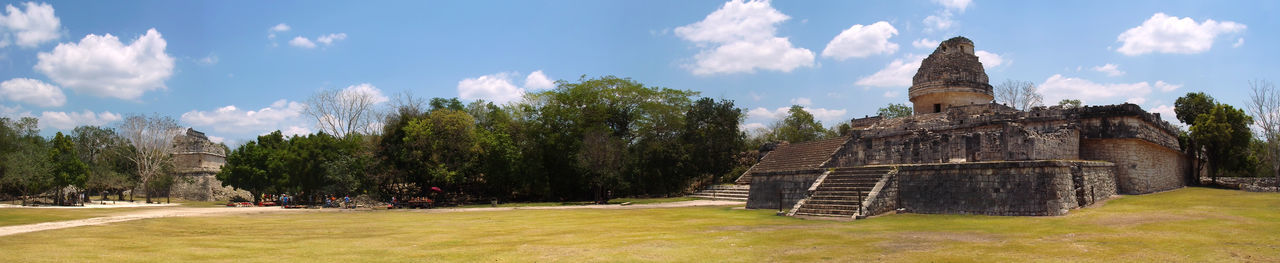 Panoramic view of temple and building against sky