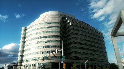 Low angle view of modern building against sky